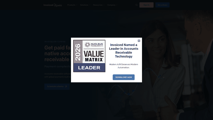 Screenshot: Invoiced (by Flywire) homepage that emphasizes AI‑native accounts‑receivable automation and cash‑matching capabilities.
